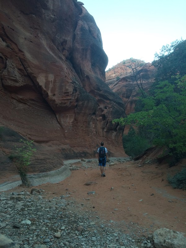Walking under the red cliffs