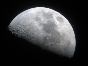 The moon from a telescope eyepice