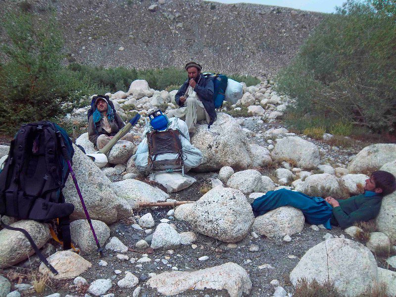 Exhausted porters resting at Ghari 