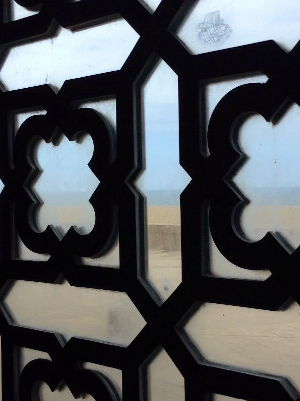 View of the beach from inside mosque