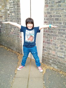 Standing over The Meridian Line at Greenwich.