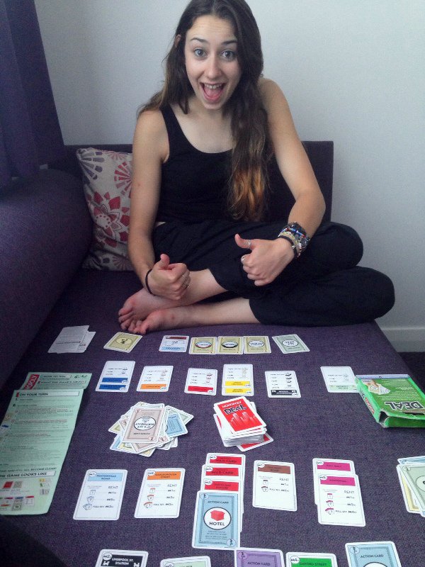 Teaching Han how to play monopoly deal during our 11 hour delay