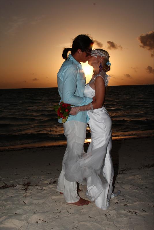 in love kiss wedding beach  maldives