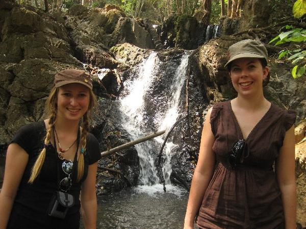 Us on our trek in front of....a waterfall!