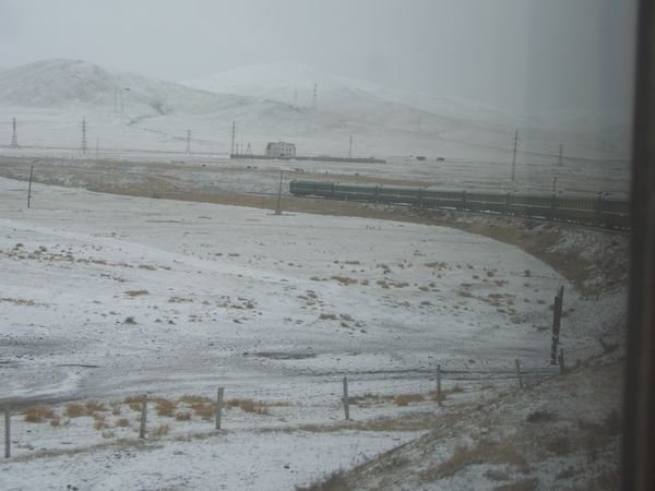 LEAVING SNOW COVERED MONGOLIA BY TRAIN