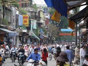 ON THE CRAZY OVER CROWDED STREETS OF OLD HANOI