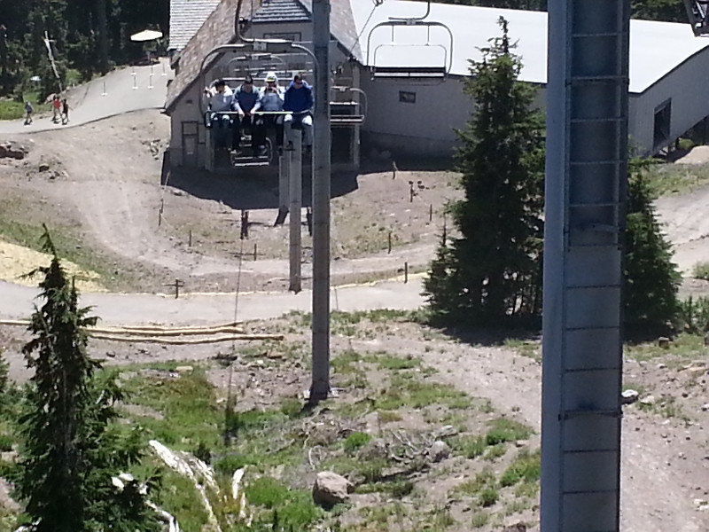 We take a ski lift up to the snow