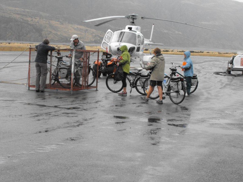 Loading the helicopter with people and bikes