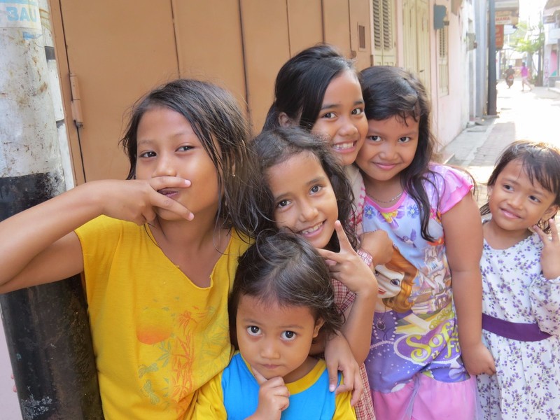Children happy to pose for a photo