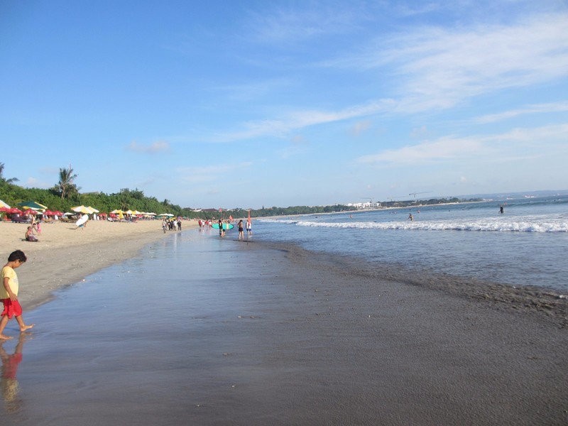 Kuta beach stretches on for miles
