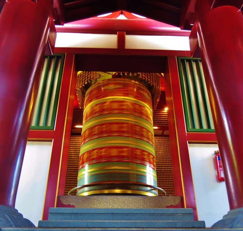 Tibetan prayer wheel at Buddhist temple
