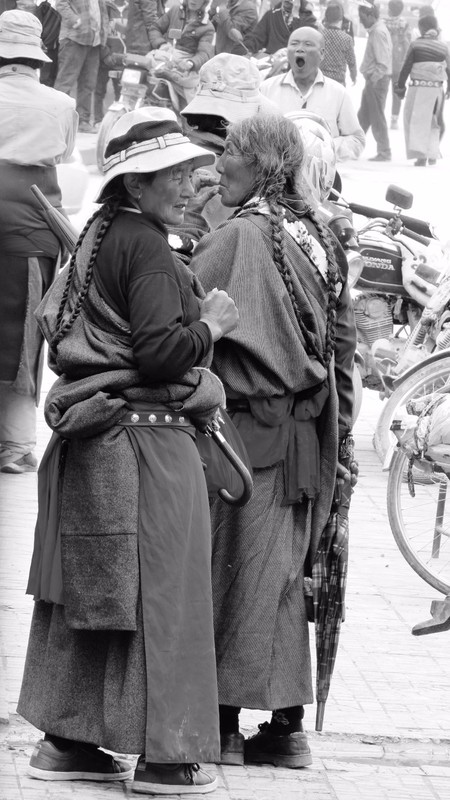 Local women with their long plaited hair