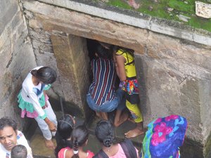 Worshippers entering the holy well