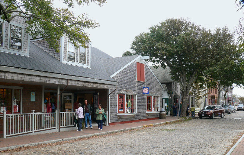 Main Street (1697) was paved with cobblesones imported from the mainland in 1837.  Note the grey cedar shakes, one of only two materials allowed.