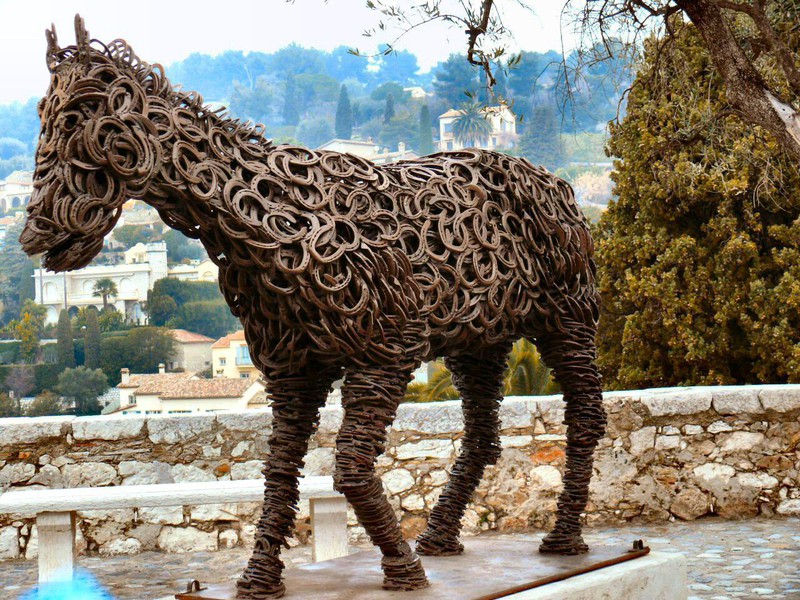 This unique horse is made entirely of horse-shoes.