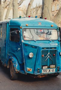 I couldn't resist shooting this battered old farmer's van at the market
