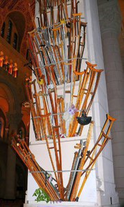 Many cured pilgrims leave their crutches and prostheses as testimonials.  Claims of cures are carefully researched before being accepted as genuine.