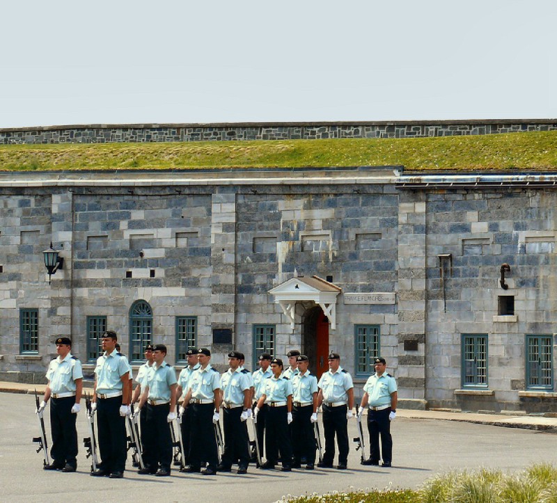 practising for the Changing of the Guard ceremony in daily dress in front of the the R 22e R Museum