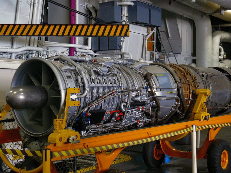 This jet engine is just one of the 60 models, flight simulators, real aircraft components, and hands-on displays arranged on the hangar deck,