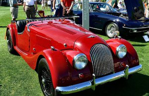 The hand-built Morgan is a status symbol.   Google their fasinating story.