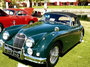 Following the successful XK-120 and -140 models, the Jaguar XK 150 adopted a one-piece windshield.