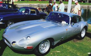 The XKE ... the world-famous ''e-type JAG'' which among enthusiasts is spoken of in the same tone of awe that aircraft lovers reserve for the WWII Spitfire.