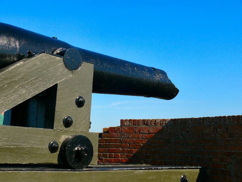damaged cannon on the parapet