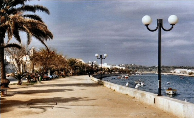 The entrance features a long seaside promenade