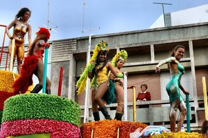 Some floats feature sensuous dancers, many from Brazil