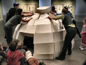 kids learning how to build a (styrofoam) igloo