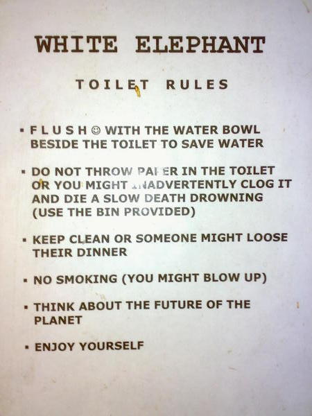 Funny sign in toilet at the 'White Elephant' restaurant