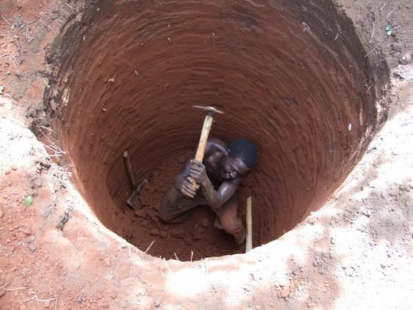 Digging a bore hole.