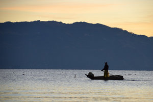 Sunrise fisherman on Lake Atitlan
