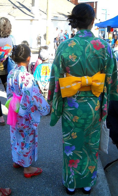 Some women/girls in traditional kimonos. 