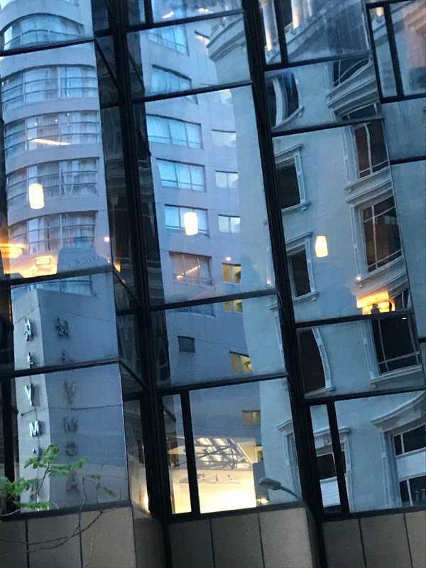 Buildings reflected on buildings
