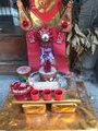 Everywhere you go, at foot level, are these little shrines. I liked the lollies being offered in this one