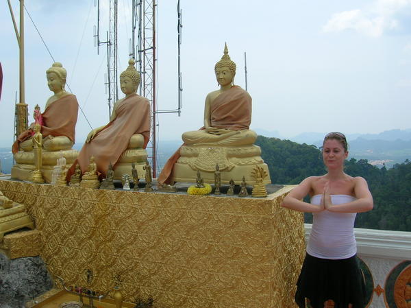 Ruthy praying to Budda