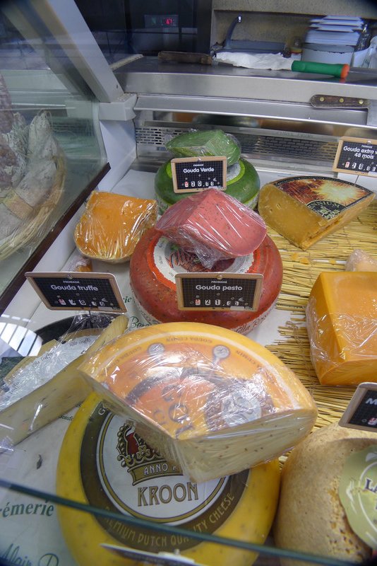 Different Coloured Gouda Cheeses