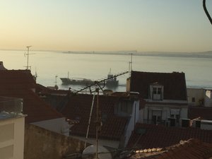 Early Lisbon, with passing traffic.