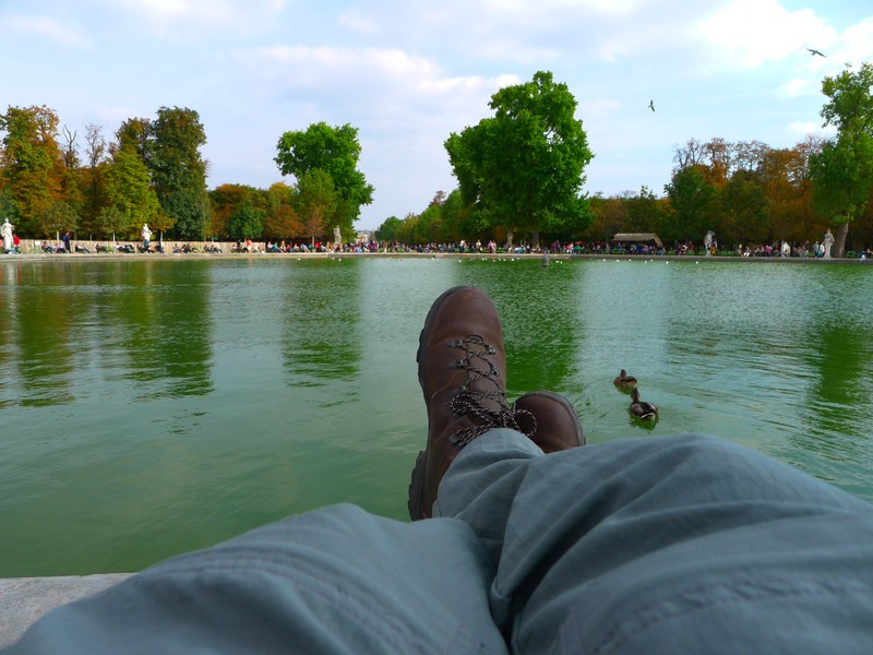 Relaxing by the lake at jardin Des Tuileries near the Louvre