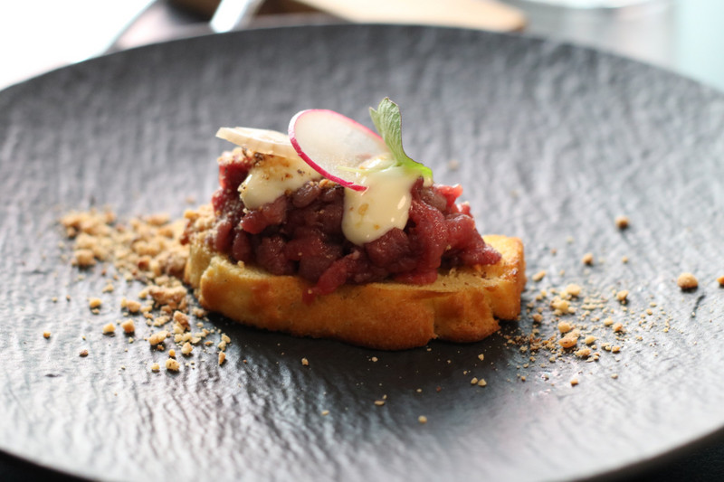 Veal tartar with hazelnut mayonnaise and pickled onion