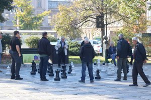 Retirees playing chess in Trg oslobođenja - Alija Izetbegović