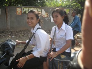 School girls riding their moto