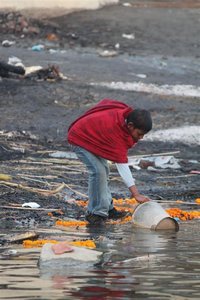 Kid collecting water
