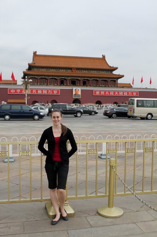 Bianca in Tiananmen Square with the walls of the Forbidden City in the background