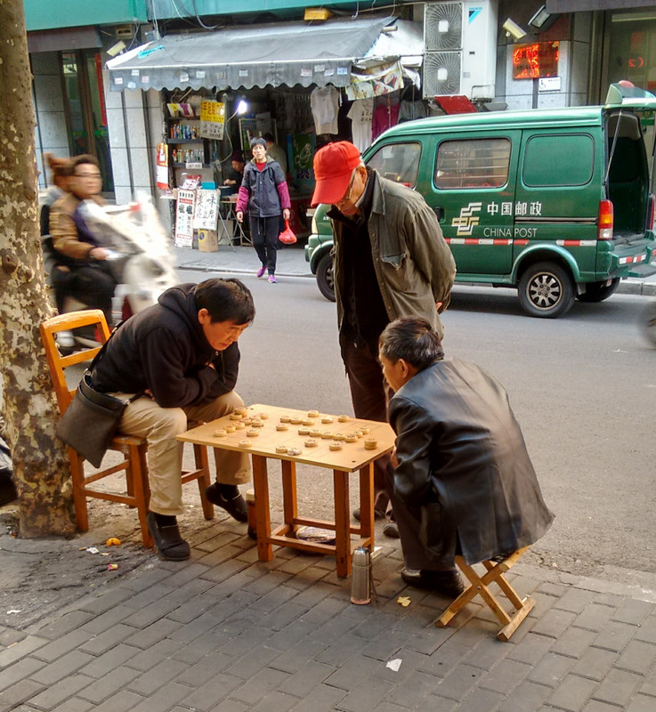  Shanghai: chaps playing checkers