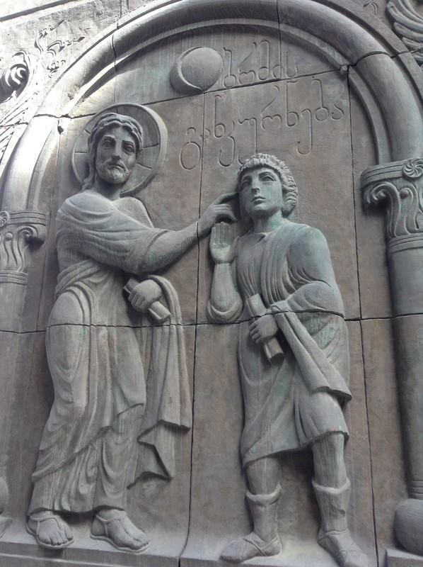 Jesus depicted curing the blind on the History of Georgia monument.