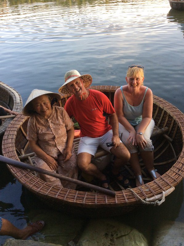 Us and our captain in a bucket boat
