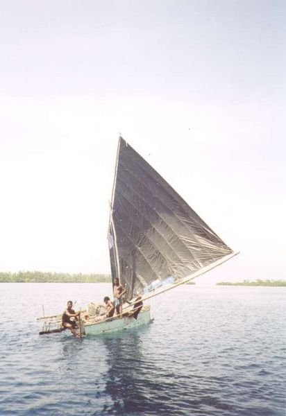 Local boys sailing in the lagoon