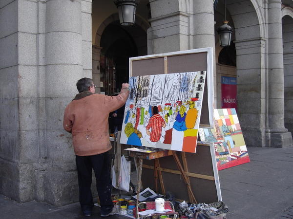 A painter at work in Plaza Mayor